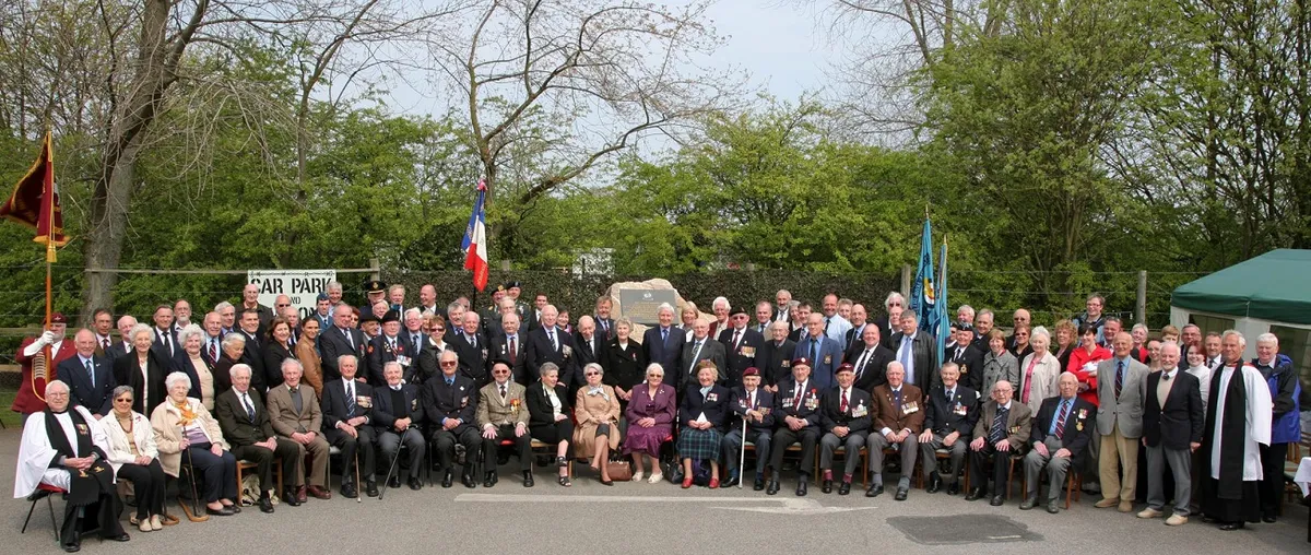 ELMS members gathered at the Memorial to the Helpers