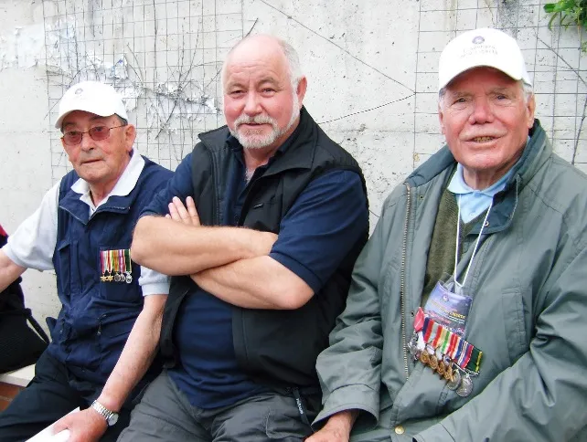 Bernard Collier, Steve Sims and Mick Wagner sitting together during the 2003 trail