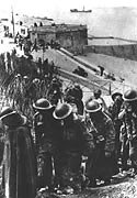 French civilians watching captured British troops march past