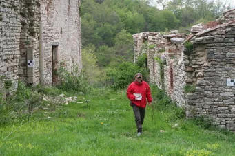 Danilo Baldini walking among the ruins of Casa Roti in April 2015