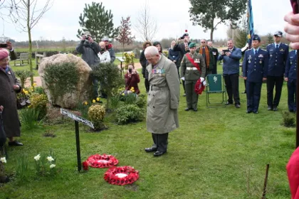 Major David Sharpe laying a wreath at the memorial