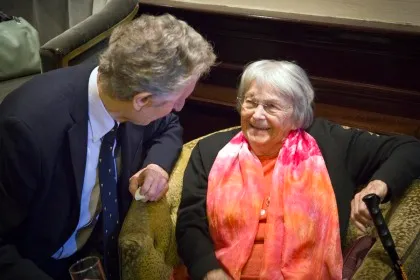 Two guests talking at the Royal Air Force Club lunch