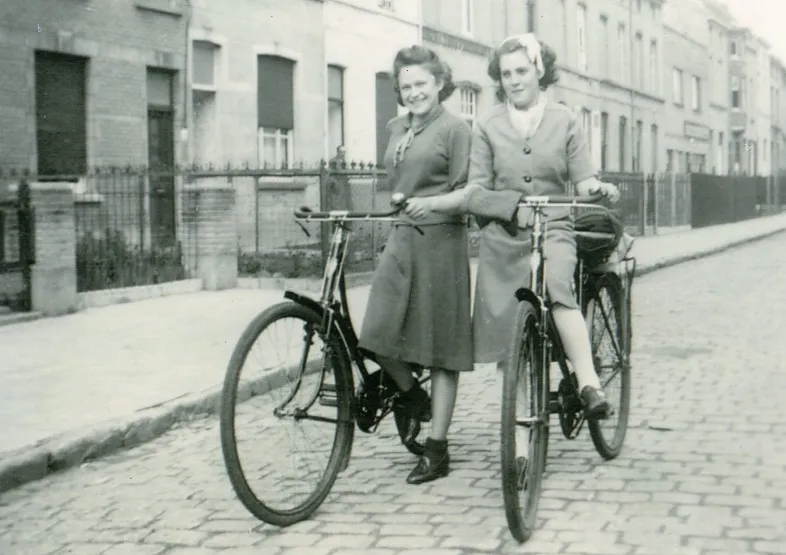 Nadine and her sister Michou with their bicycles