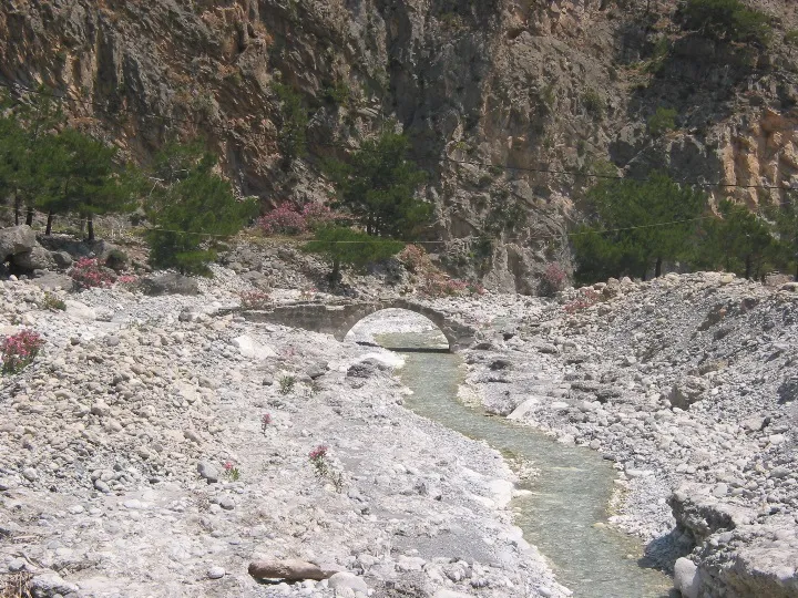 Stone bridge crossing a stream in the Samaria Gorge