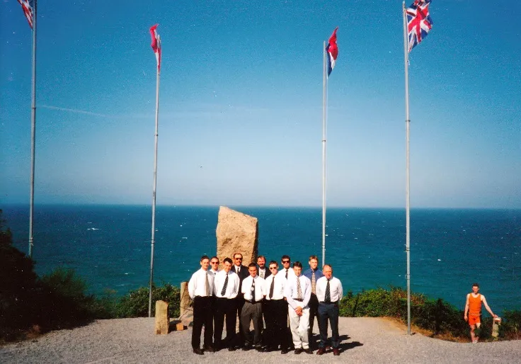 Group gathered at the Shelburn memorial above the Brittany coast