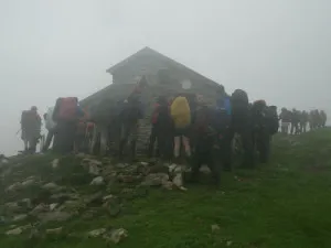Walkers gathered at a mountain refuge