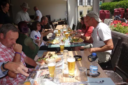 Le Chemin walkers sharing a meal
