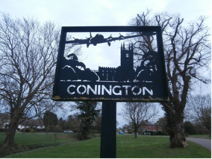 Village sign in Conington
